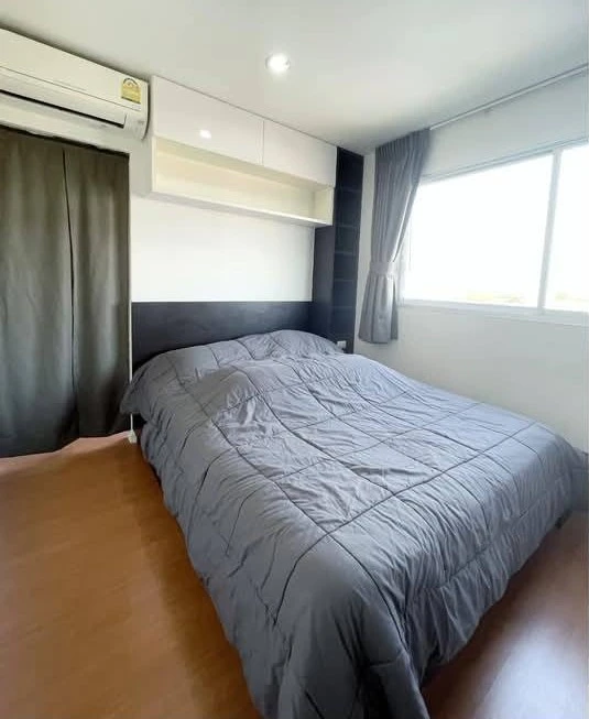 For sale: Lumpini Condo Town Ramintra-Lat Phrao 2, large room, 2 bedrooms, 2 bathrooms, city view, cool breeze, with built-in furniture, very worth bo