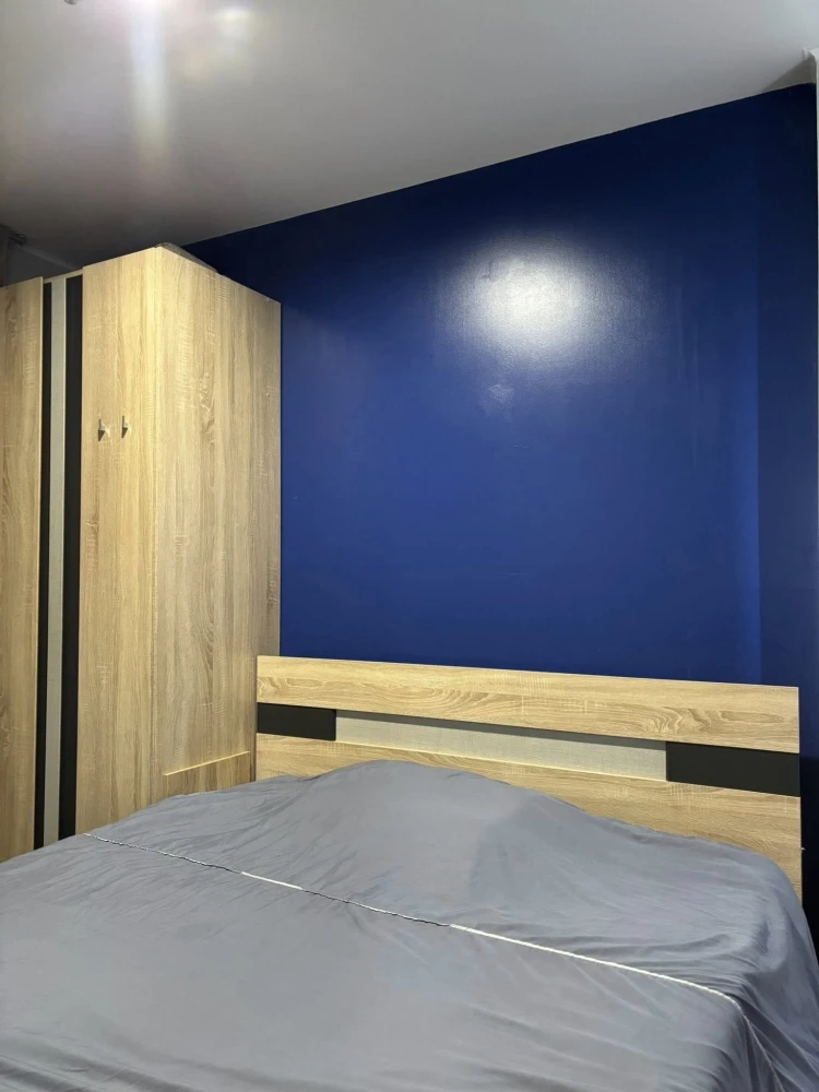 For sale: Lumpini Condo Town Ramintra - Nawamin, Building C, 15th floor, dark blue room, looks calm and inviting to relax. Hurry and book before you m