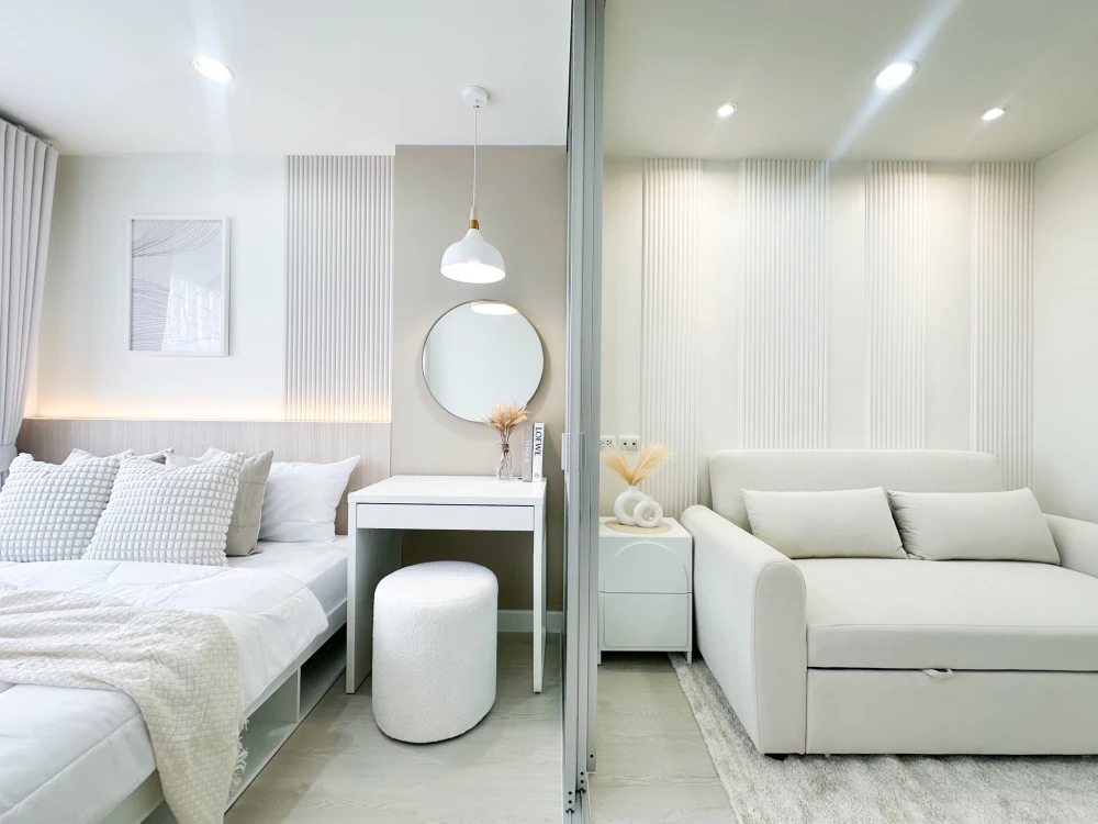For sale: Lumpini Condo Town Ramintra - Ladprao 2. Fully furnished, SPC flooring, beautifully decorated. Don't miss out!