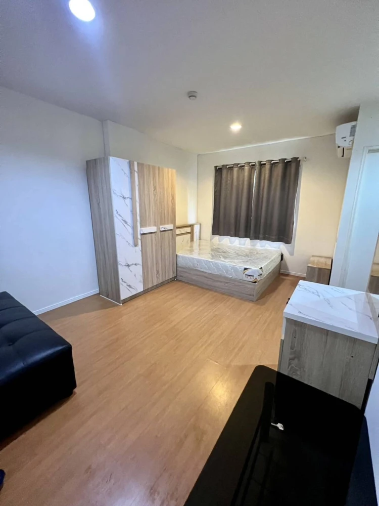 For sale: Lumpini Township Rangsit Klong 1, Building E4, 1st floor, with trees on the balcony, very shady, fully furnished, don't miss out!