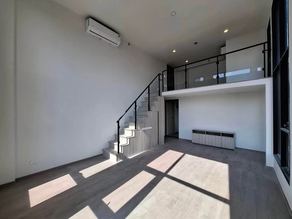 For sale: Origin Play Bang Khun Non Triple Station. Large unit, a rare find with only 3 units in the entire building. River view. Don't miss out!