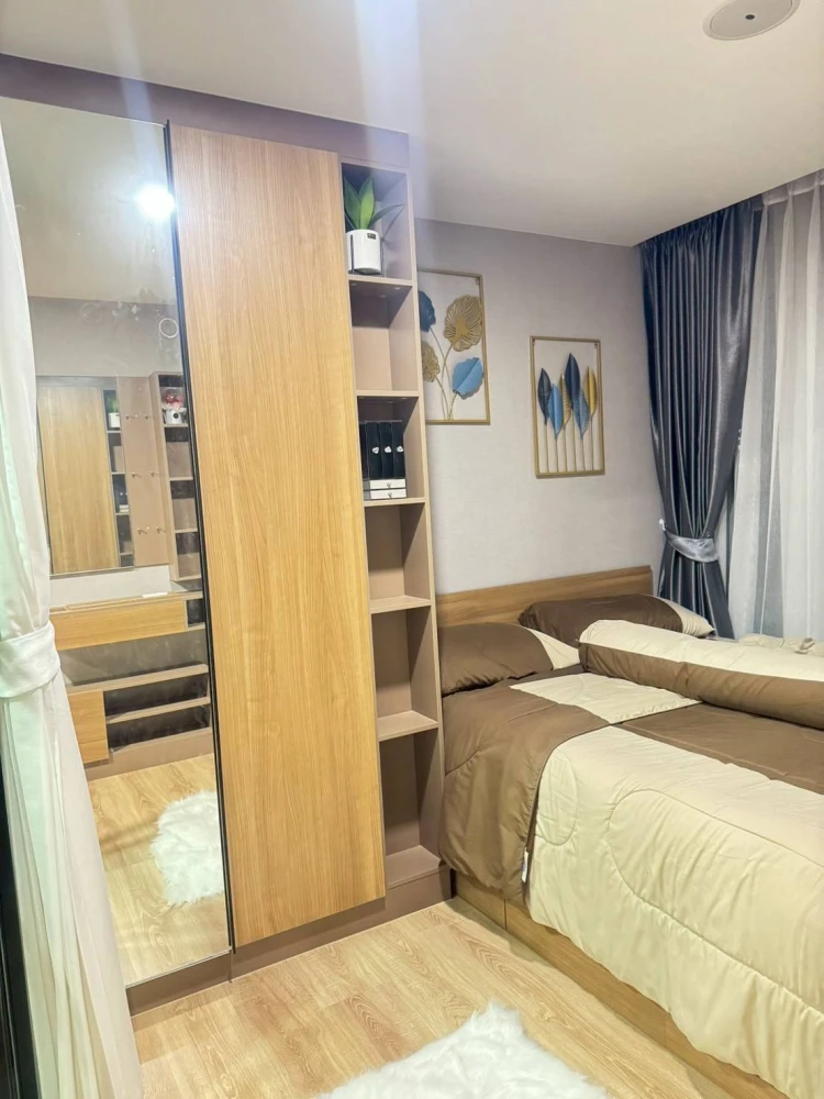 For sale: The Cube Loft Lat Phrao 107, decorated in a modern loft style, panoramic city view, with Bluetooth speakers embedded in the ceiling. Don't m