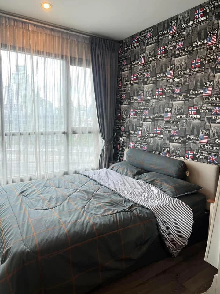 For sale: The Base Park West, 7th floor, expressway side, with wallpaper in a chic pattern throughout the room, complete with furniture. You will regr