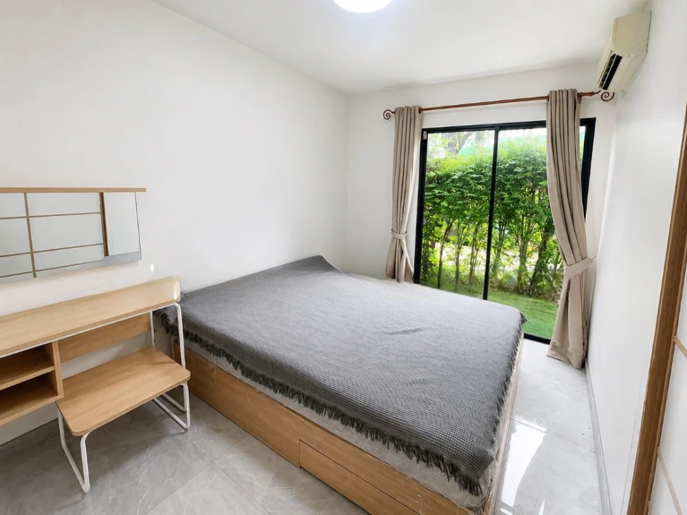 For sale or rent: iCondo Ngamwongwan, 1st floor, with private garden, separate kitchen, and balcony access to the garden. Hurry and reserve yours!