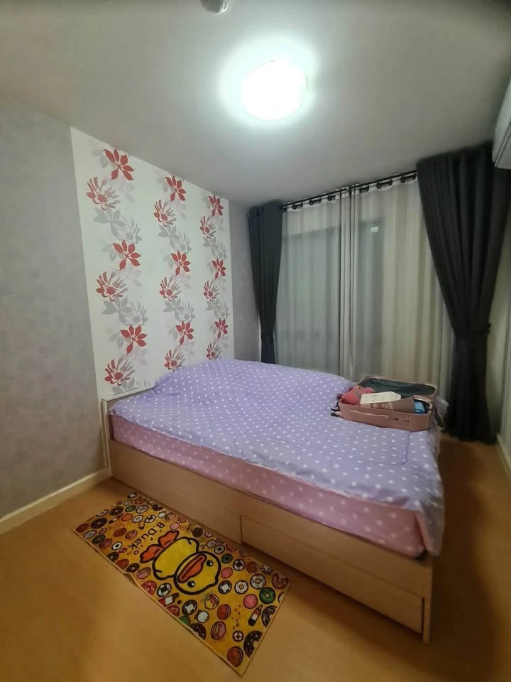 For sale: I-Condo Sukhapiban 2, with wallpaper in a very cool pattern throughout the room. The room is on the 2nd floor, next to the fire exit, defini