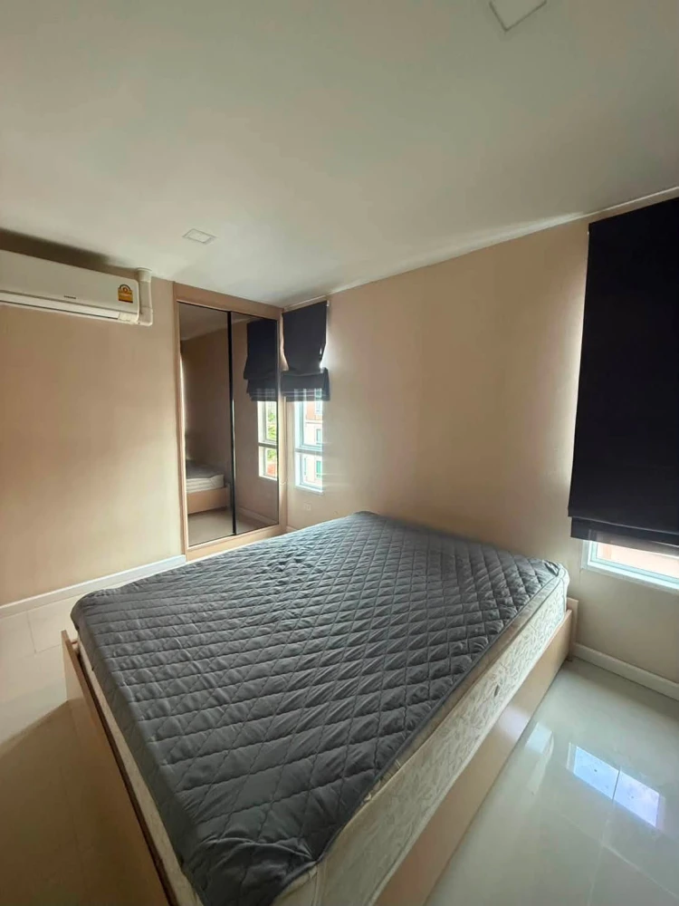 JW Condo for sale @ Don Mueang. Well-ventilated unit with garden view. Parking available in the building. Book now!
