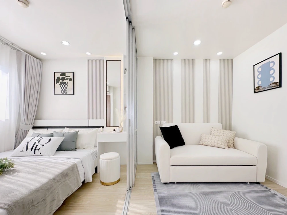 Selling Lumpini Condo Town Ramindra-Lat Pla Khao, 2nd floor unit. Beautifully decorated with a consistent color scheme and fully furnished. Book now!