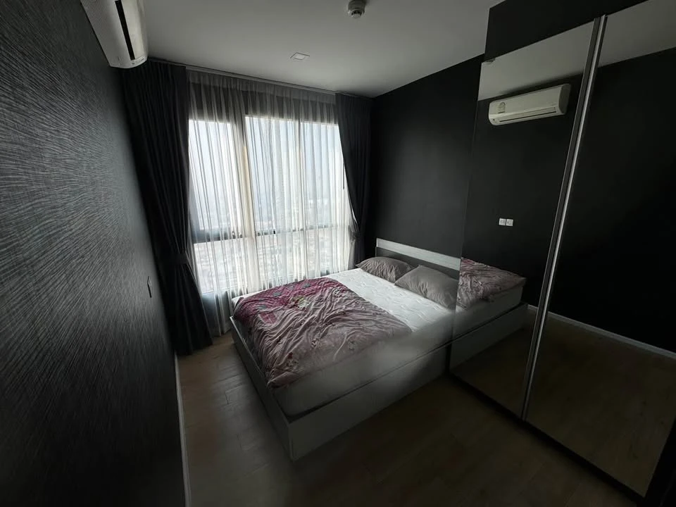 Selling a 1 Bed Plus corner unit in Notting Hill Leamchabang, located in the right building at the front of the condo, with a view of Kasetsart Univer