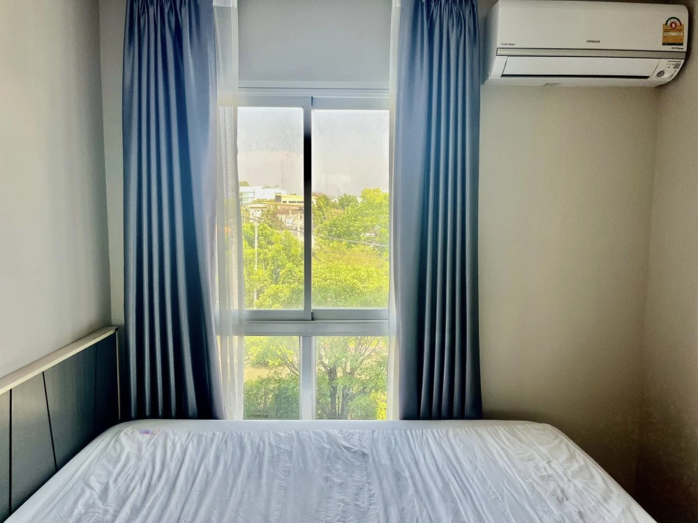 Plum Condo Chaengwattana Station for sale: 2 bedrooms, spacious living area, and complete amenities. Book now!