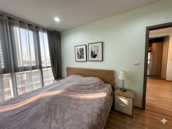 Selling THE BASE Garden-Rama 9, 2 bedrooms, spacious living area, and complete amenities. Don't miss out!