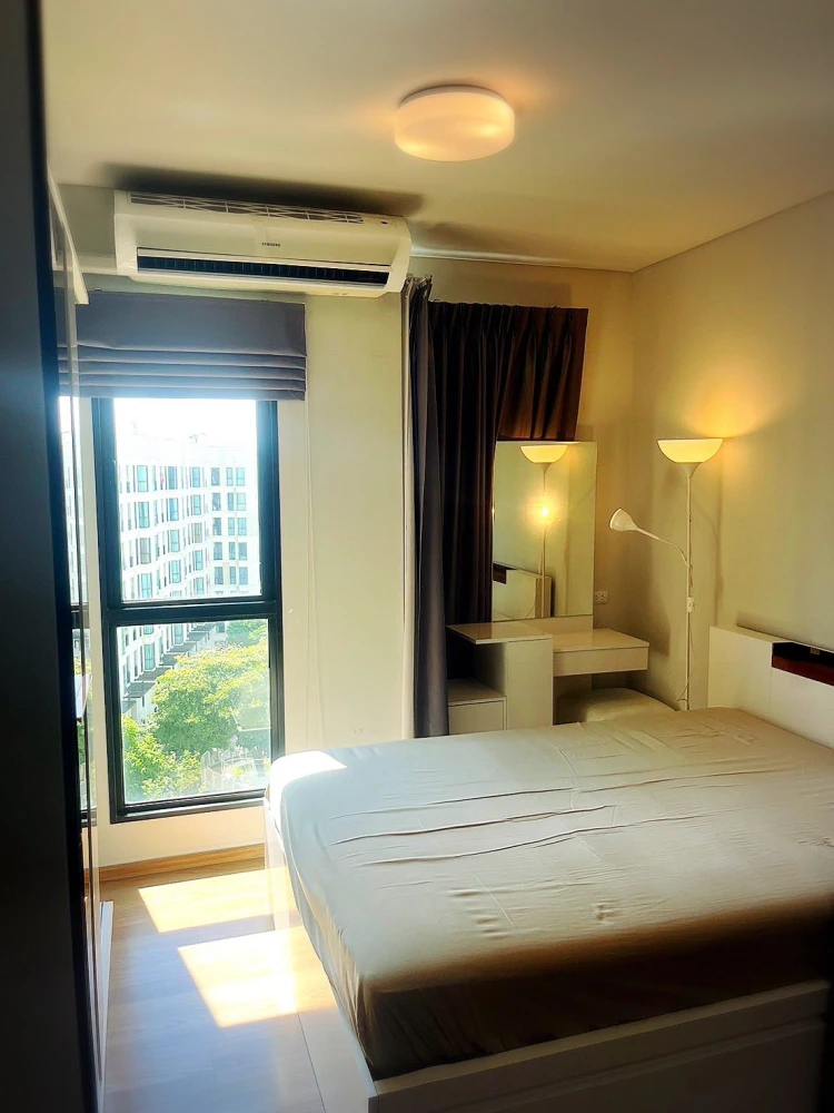 For sale: Unio Sukhumvit 72 Phase 1, 8th floor, room with swimming pool and garden view, includes all furniture, decorations and electrical appliances