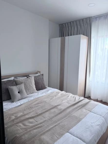 Condo for rent at The Living Ramkhamhaeng. The unit is partitioned into separate, well-defined zones. Great price! Book now!