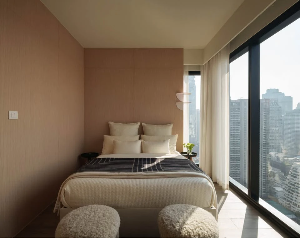 For rent: The Lofts Silom Duplex, 2 bedrooms, 2 bathrooms, 5.6-meter high ceilings, 29th floor, East-facing with city view. Book now!