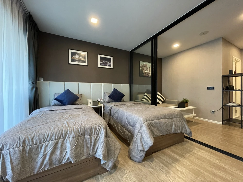 Condo for rent at Kave Town Space, high floor corner unit. Spacious, airy, and comfortable with a relaxing garden view of greenery. The room is cool a