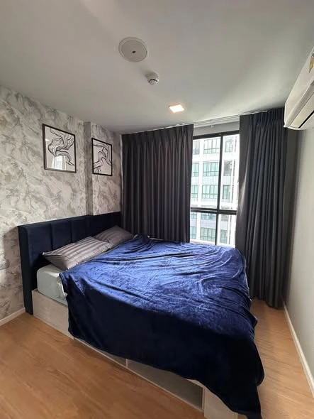 Spacious rooms for rent at Atmoz Canal Rangsit. Plenty of usable space, high-quality wallpaper, great value. Book now!