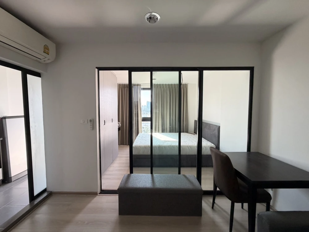 Condo for rent at Rise Rama 9. The unit is partitioned into separate, clearly defined zones. Great value! Book now, don't miss out!