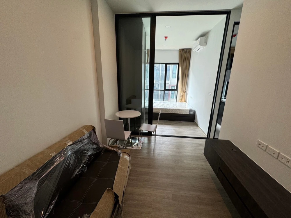 For rent: The Origin Plug & Play Ramintra. Modern style room with built-in furniture throughout. Fully furnished.