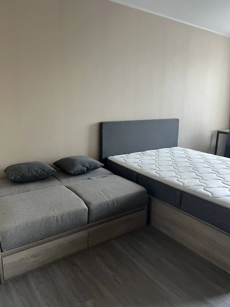 For sale/rent: D Condo Hideaway Rangsit Phase 4. There is a glass door separating the bedroom and kitchen. Very attractive.