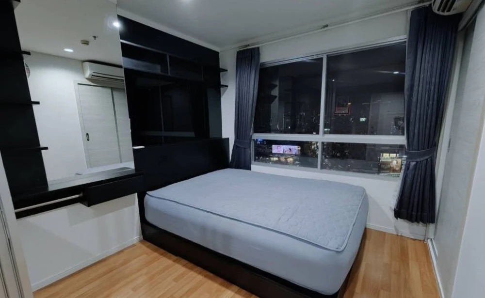 For rent: Lumpini Park Rama 9-Ratchada, 27 sq.m. room with city view towards RCA, loft style built-in furniture. Book now before it's too late!