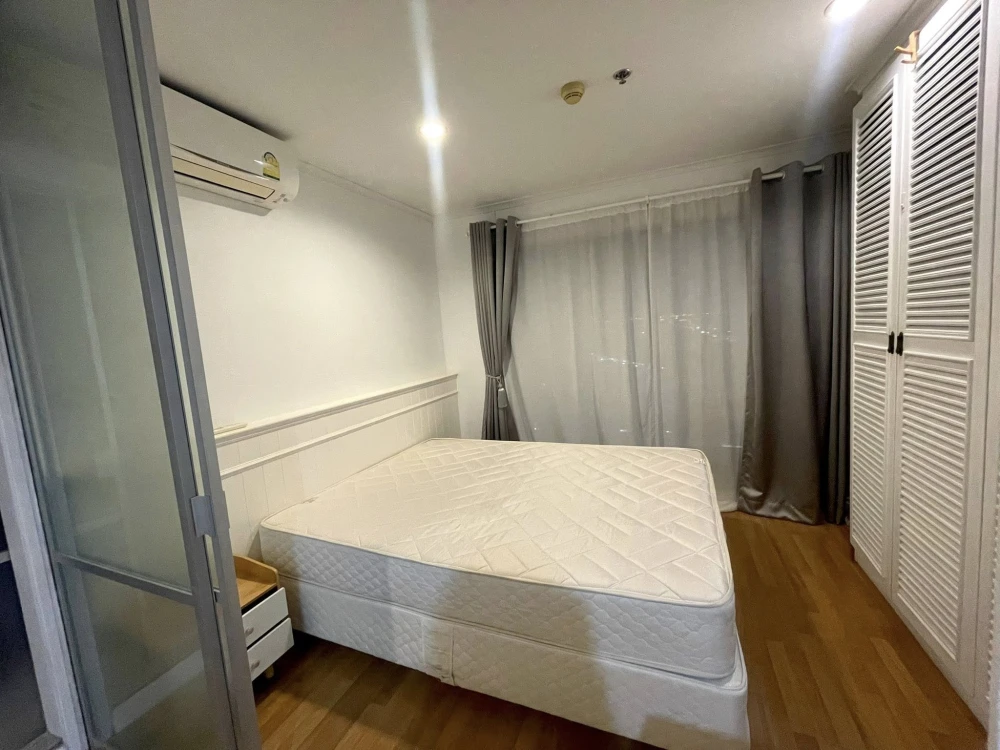 For rent: Lumpini Place Ramintra-Lak Si. Spacious room with partitioned bedroom. Built-in large wardrobe. Sofa bed, made to order, size 2 meters.