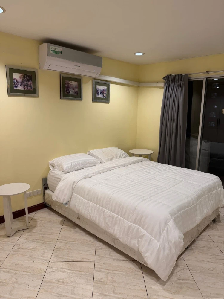 For rent: 2-bedroom, 2-bathroom apartment at Witthayu Complex. Features a large living room, fully furnished, and ready to move in.