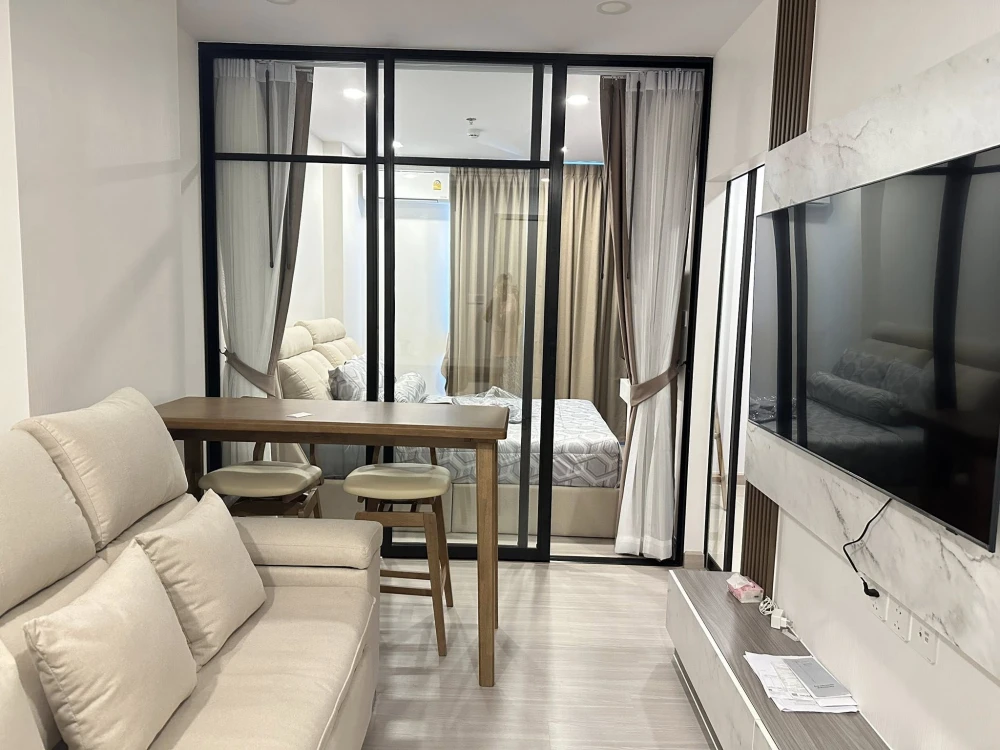 For rent: Supalai Lite Tha Phra - Wong Wian Yai, high floor unit with stunning nighttime city views. Fully furnished and equipped with appliances. Jus