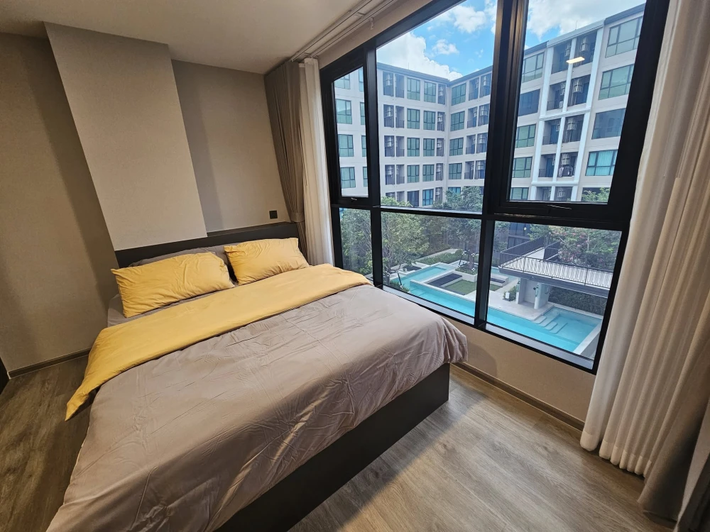 For rent: Atmoz Palacio Lat Phrao Wang Hin, 1 bed plus, 5th floor, swimming pool view, garden view, very good breeze, come and reserve now, don't dela