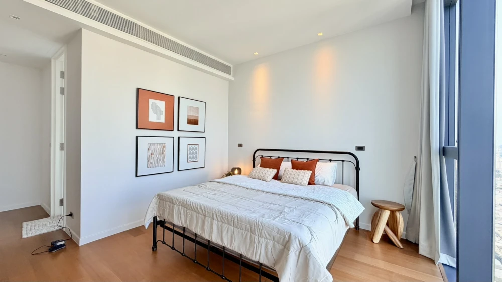 For rent: Canapaya Residences, 2 bedrooms, spacious living area, minimalist design, fully furnished. Book now!