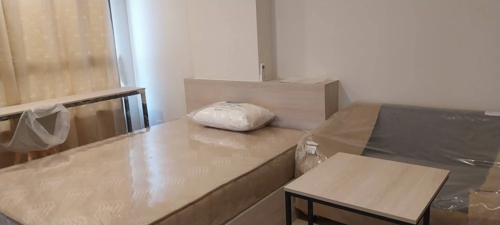For rent: D Condo Ramkhamhaeng 40, studio room, 6th floor, clear view, good breeze, fully furnished, ready to move in.