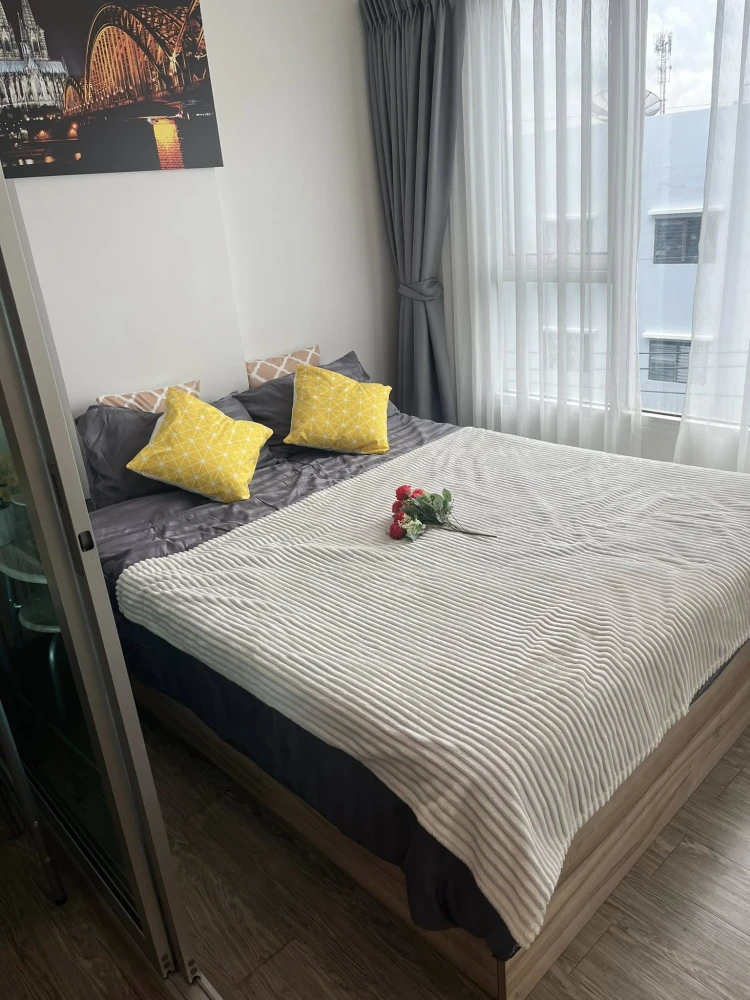 For rent: Happy Condo Donmuang The Terminal, a lovely room with complete furniture and appliances. Don't miss it!