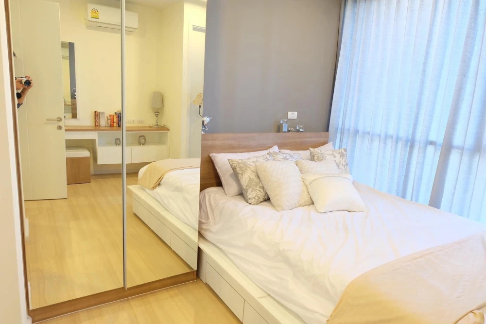 For rent: Happy Condo Ladprao 101, 2 bedrooms, spacious living area, beautifully furnished and fully equipped. Don't miss out, book now!