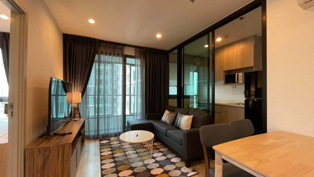 For rent: Ideo Mobi Charan-Interchange, 17th floor, north-facing, ready to move in. The unit has a partition separating the kitchen and living area.