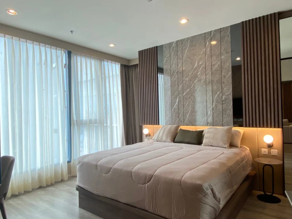 For rent: Ideo Mobi Sukhumvit 66, 2 bedrooms, spacious living area, high-quality built-in furniture. Book now!