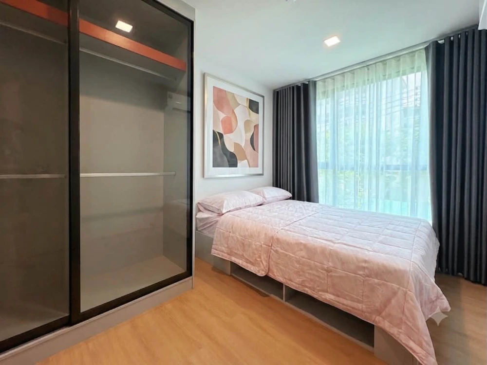 Kave Luminous Bangmod for rent. Corner unit, near the fire escape, north-facing windows, receiving less direct sunlight, so the room stays cool. Book