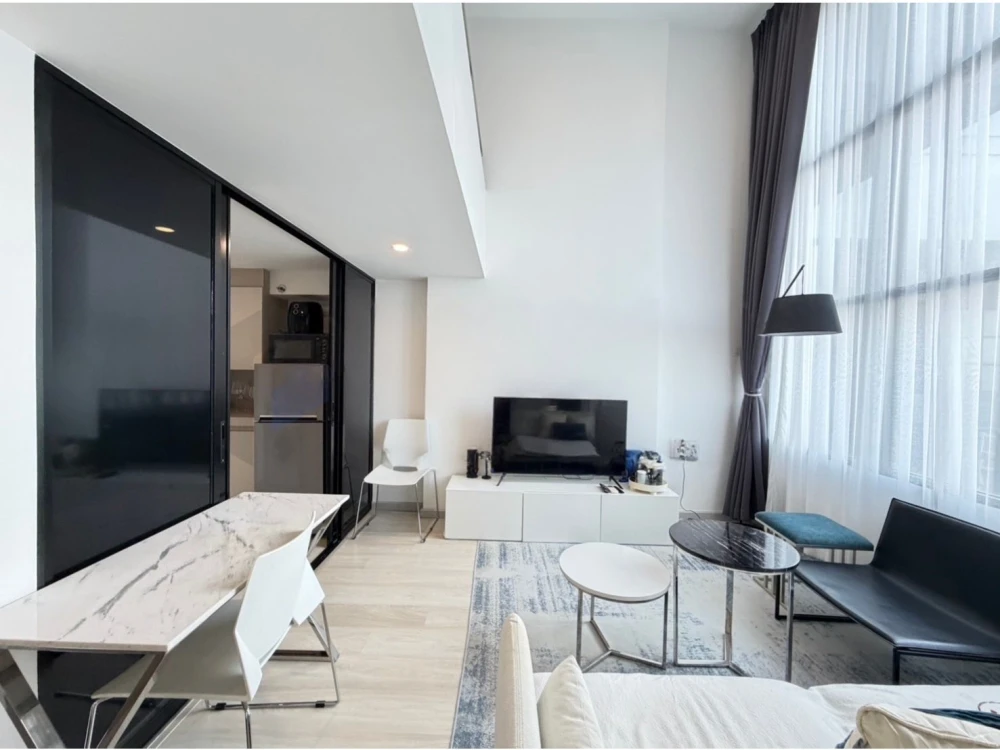 For rent: Knightsbridge Prime Sathorn. Very high floor duplex unit with stunning city views. Luxurious, high ceilings. Don't miss out!
