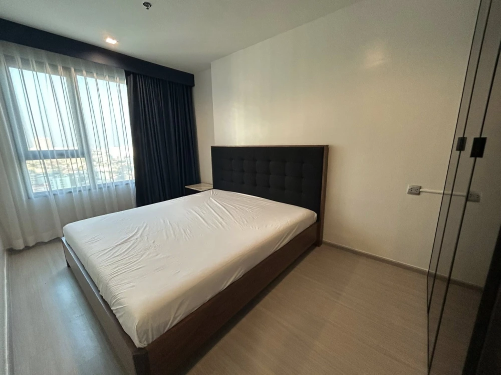 For rent: Life Ladprao, very high floor unit. Fully furnished with appliances, ready to move in.