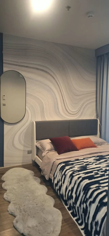 For rent: Life Ladprao Valley, very high floor unit, beautifully decorated and very livable. Fully furnished with appliances, separate kitchen area.
