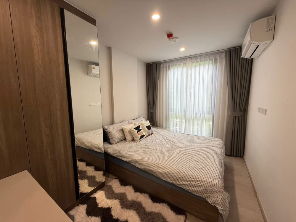 For rent: Nue Core Khu Khot Station, Building D, 2nd floor, shady garden view, fully furnished + full set of electrical appliances!