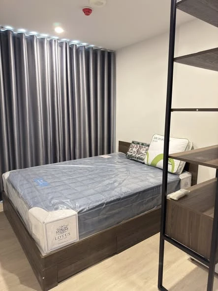 For rent: Nue Cross Khu Khot Station, 8th floor unit with beautiful garden view and fully furnished. Don't miss out!