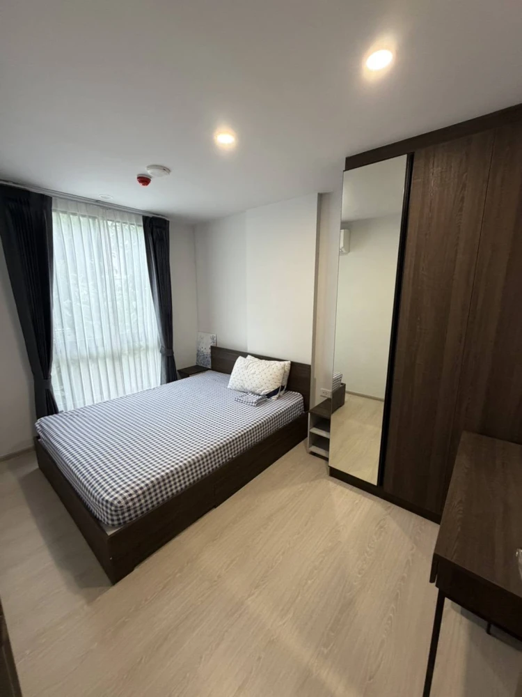 For rent: Nue Cross Khu Khot Station corner unit, offering privacy and a pool view. Fully furnished. Book now!