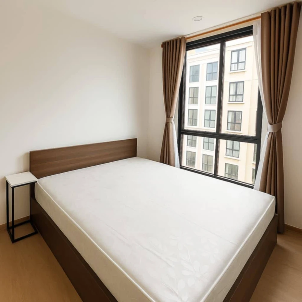 Studio apartment for rent near Nue Cross Khu Khot Station. Fully furnished with appliances and garden view. Book now!