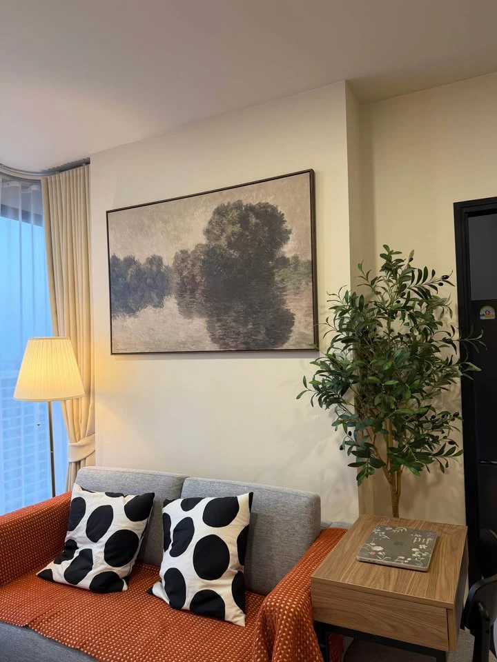 For rent: Nue Riverest Ratchaburana, high floor unit with stunning views of the Chao Phraya River and the lush green Bang Krachao area.
