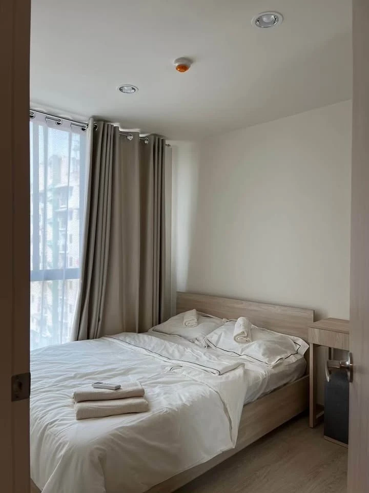 Two-bedroom apartment for rent at NUE Z-SQUARE Suan Luang Station, fully furnished. Book now!
