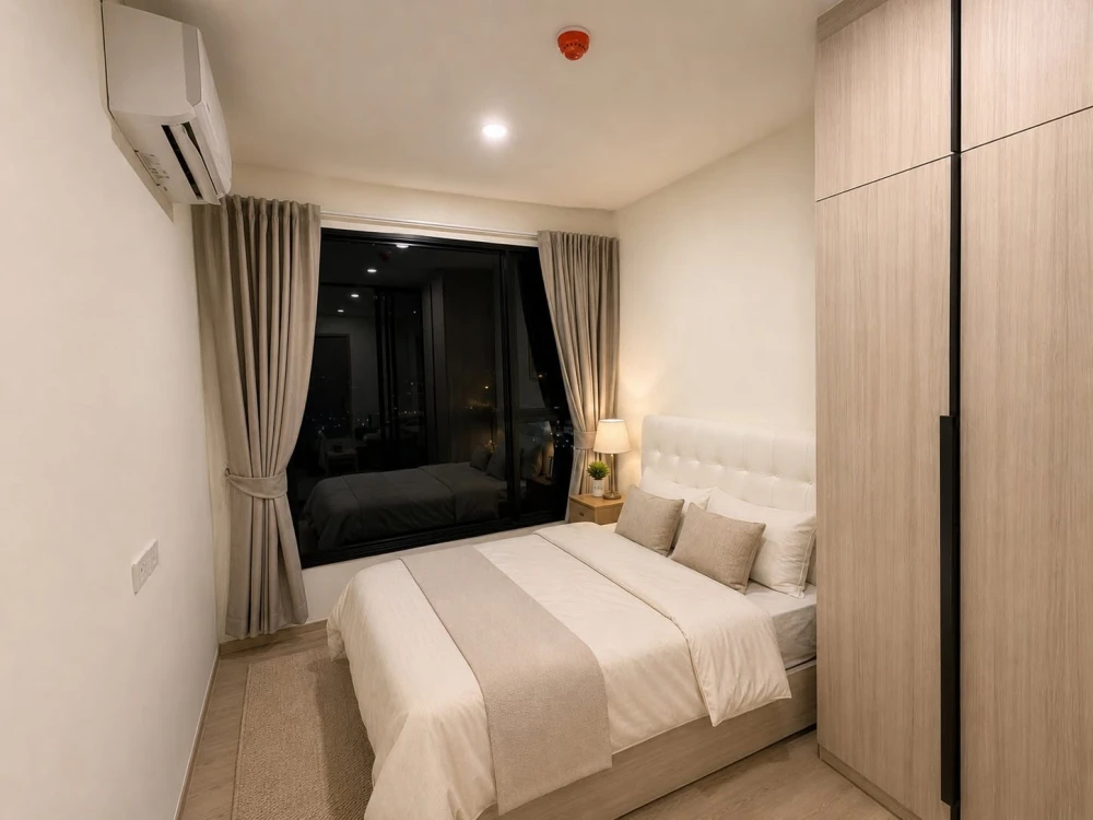 For rent: Origin Place Bangna, modern minimalist style unit with warm tones, fully furnished, separate kitchen. Don't miss out!