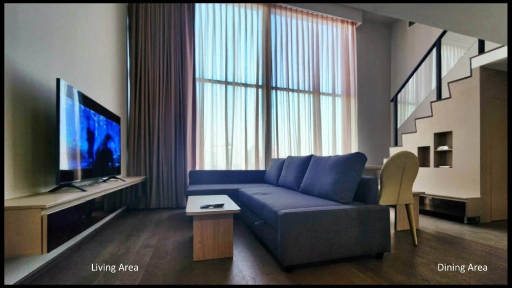 For rent: Duplex unit at Park Origin Ratchathewi. High ceilings, spacious and comfortable. High floor with stunning city views and floor-to-ceiling wi
