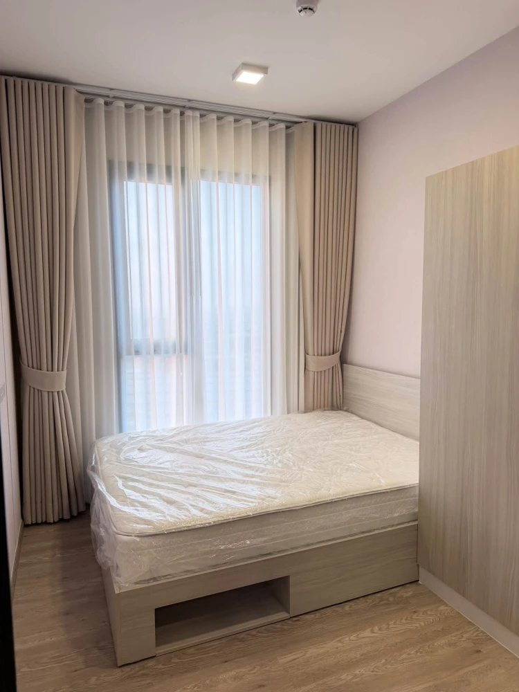 For rent: Plum Condo New West, Bang Yai. Corner unit with high 2.8-meter ceilings, fully equipped with amenities. Book now!