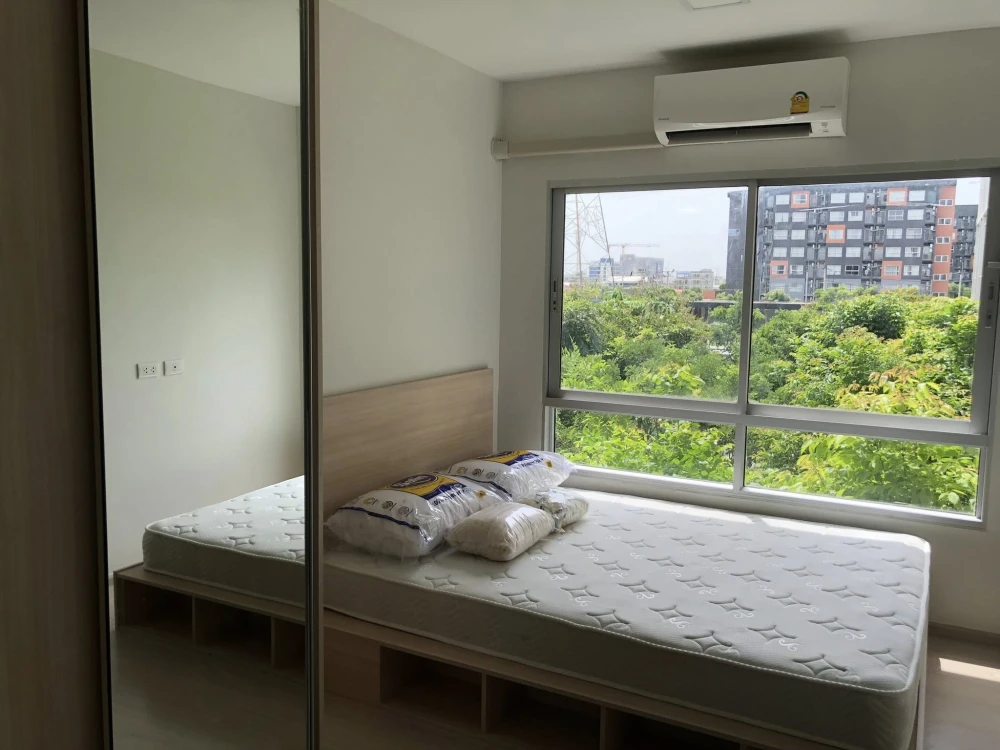 For rent: Plum Condo Rangsit Alive 2, a nice room, fully furnished, with a beautiful garden view. Book now.