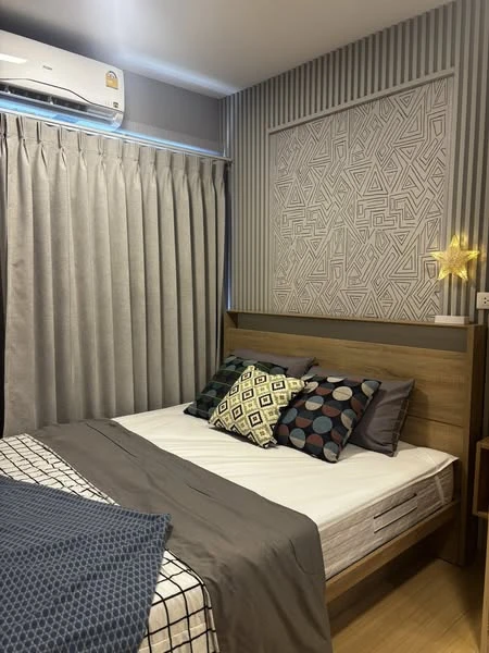 Plum Condo Rangsit Fresh for rent, a cozy room with a theme, well-built walls, and complete furniture. Reserve now!