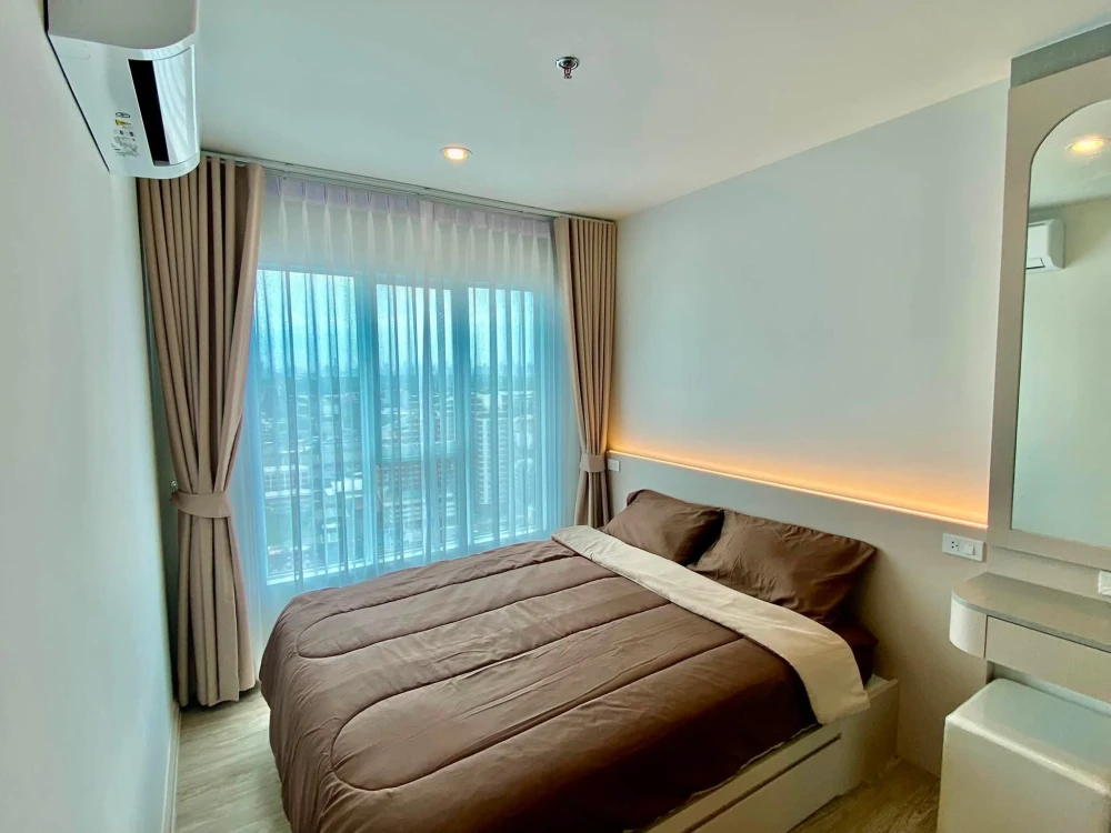 For rent: Regent Home Bangna. A lovely unit with high-quality built-in furniture and stunning river views. Don't miss out!