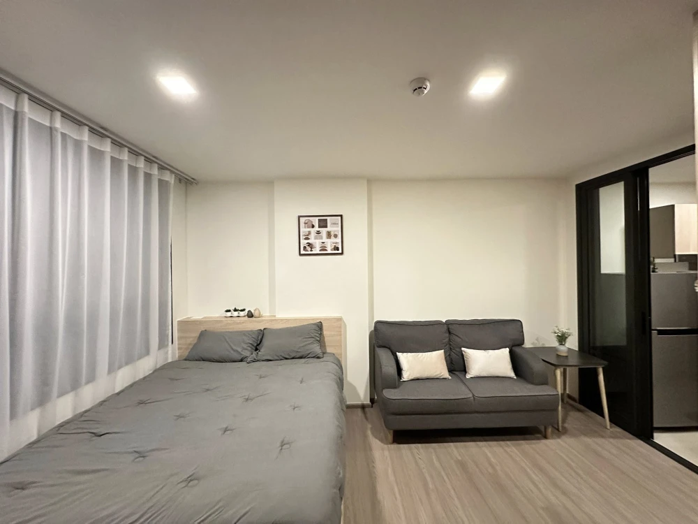 Condo for rent at The Muve Pradipat, residential side. Cool breeze, unobstructed view, fully furnished, ready to move in.